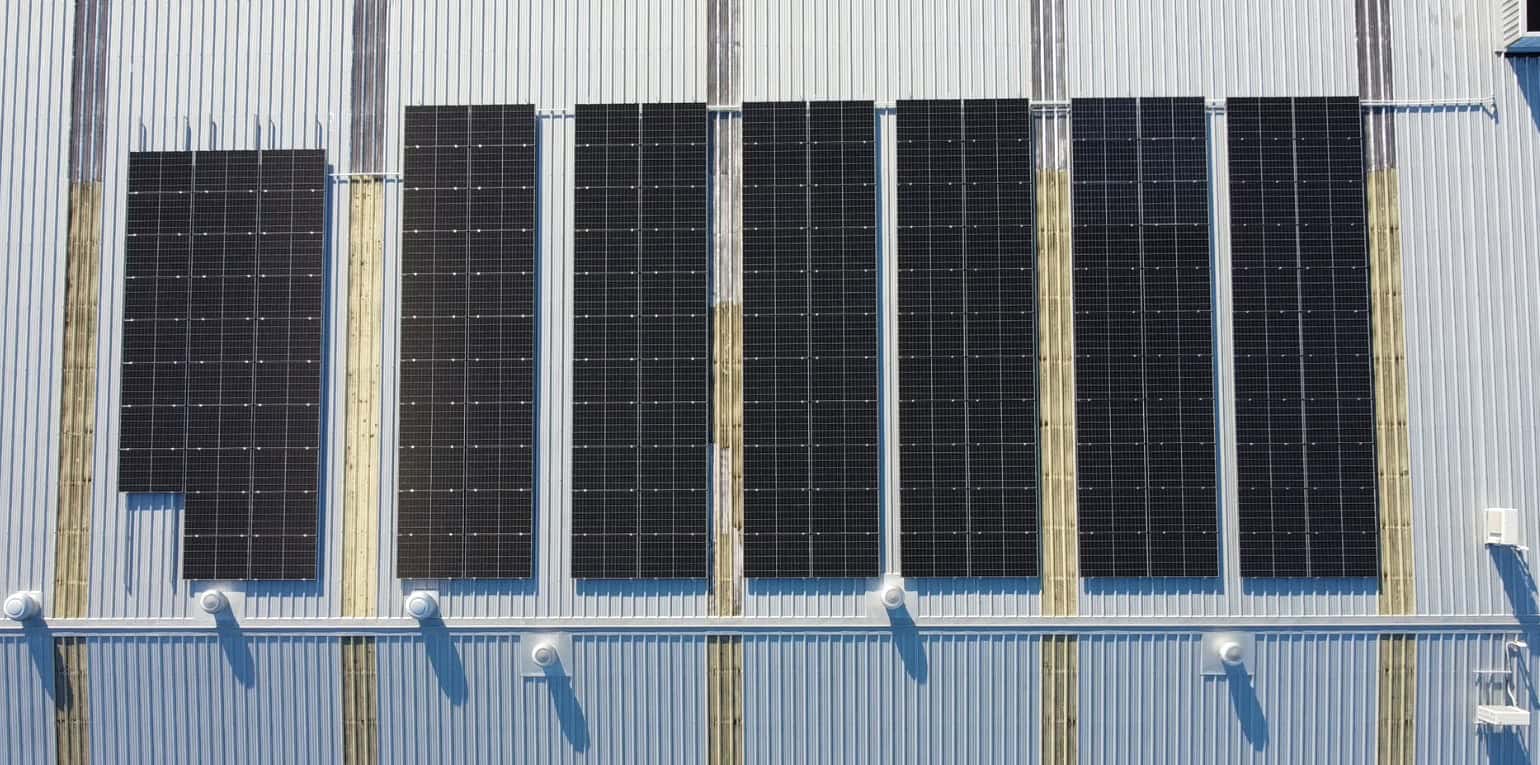 Parrs Products Commercial Solar Installation in Auckland - Birdseye view of solar panels in Auckland on a commercial building.